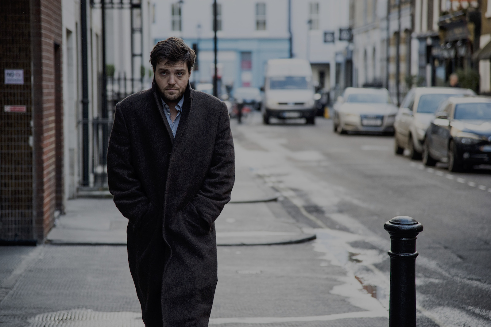 Programme Name: Strike - The Cuckoo's Calling - TX: 15/11/2016 - Episode: n/a (No. n/a) - Picture Shows:  Cormoran Strike (TOM BURKE) - (C) Bronte Films - Photographer: Steffan Hill